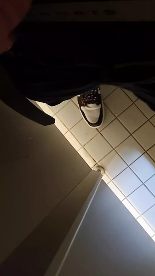 Jerking off in a public restroom