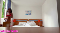 Woman Being Recorded in Hotel Room