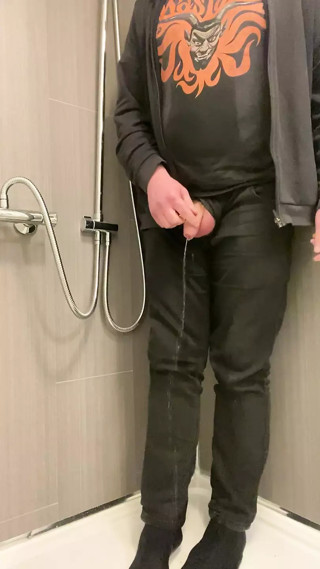 Dressed all in black piss play: pissing on myself and showing underwear