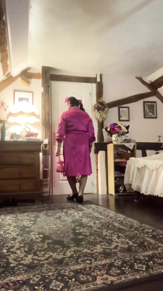 Dressed with a fuchsia dress for a night out