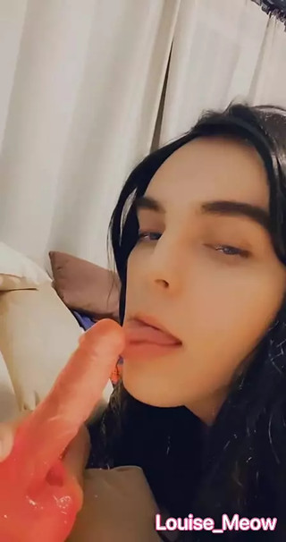 Louise sucks rubber cock sweetly