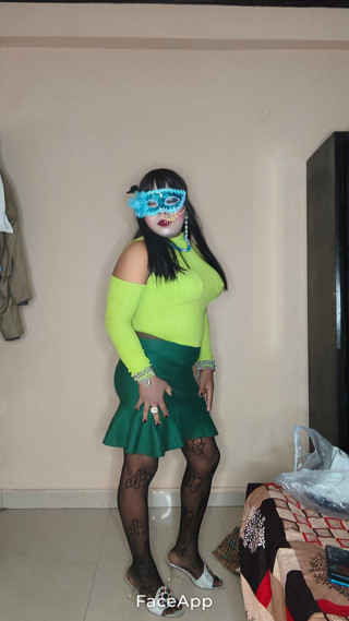 Crossdresser in Green Skirt