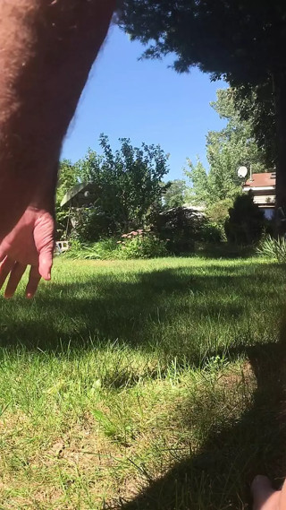 icumoveru gets naked in the backyard and has some risky fun while wearing his hollow butt plug.