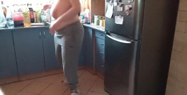 Washing dishes topless