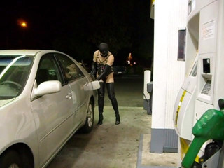 Pumping gas almost naked in fetish