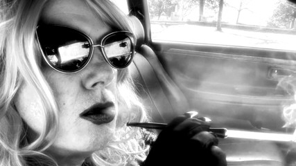 MRS. ROMAN CAR SMOKING A VS100 MENTHOL IN A SEXY CIGARETTE HOLDER thumbnail
