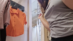 flashing tits in the fitting room with the curtain open