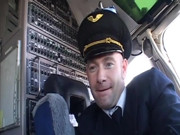 Randy pilot fondles sexy brunette in the cockpit