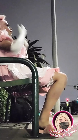Sissy maid at public bus stop 