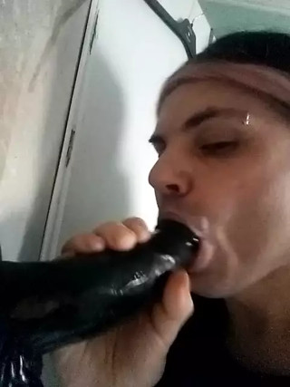 Transgirl Tiffany Deep Throats a massive black Dildo. thumbnail