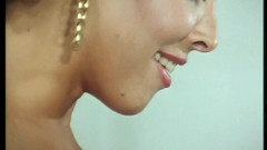 Milly D'abbraccio Fucks Roberta Cavalcante with a Strap on During a Vintage Orgy