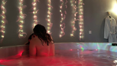 Young french couple playing inthe bath