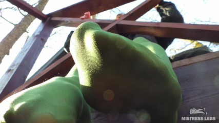 Goddess in Green Pantyhose Teases with Her Feet on the Porch