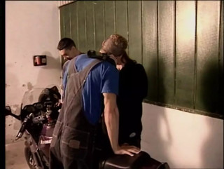Two cock in the garage for the slut