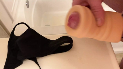 Use pocket pussy to cum on wifes black thong