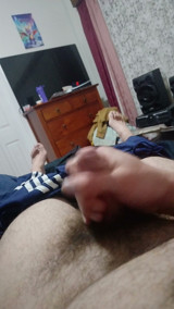 Masturbating