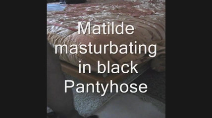 Matilde masturbating in black pantyhose thumbnail