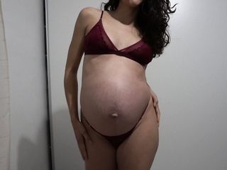 Pregnant Latina MILF trying on sexy lingerie