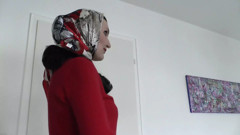 Lady Victoria Valente Showed Elegant Satin Headscarves with a Red Cashmere Turtleneck Sweater