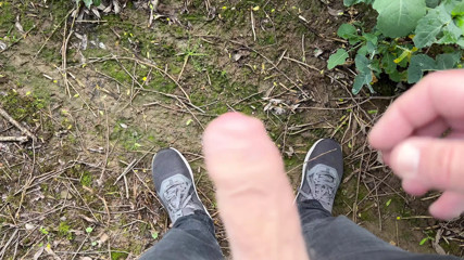 Outdoor wank and cum in a field