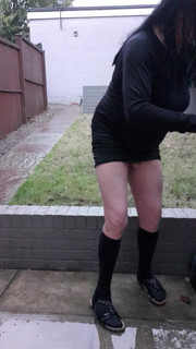 Gurl All In Black Hosepipe Shower On Patio