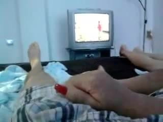 Touch with long red nails