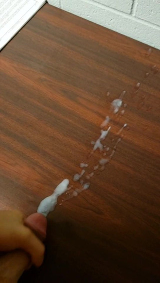 Cumming on desk