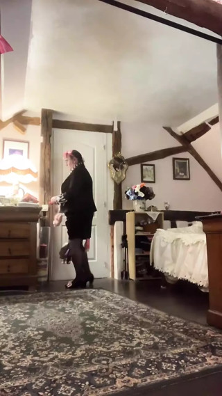 Dressed with a little black skirt and striped blouse for a night out