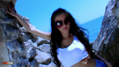 Candy Alexa: Pornostar Petite Brunette with Big Boobs Candy Alexa Doing a Strip in the Rocks