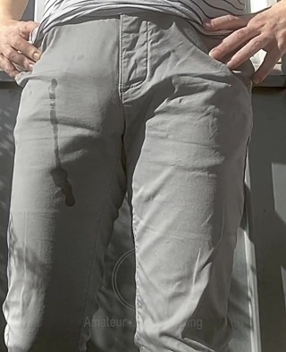 Jules Wets His Grey Pants and Exposes His Semi-hard Cock Through His Trousers