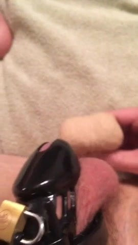 Cum in chastity with dildo