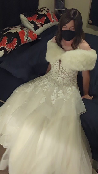 Making love to bride's luxurious wedding gown and white fur shawl thumbnail