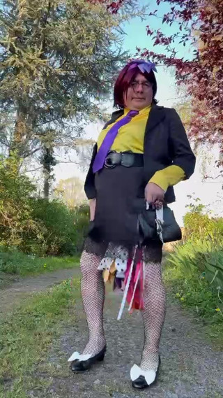 Dressed with a black skirt trimmed with lace for an evening thumbnail