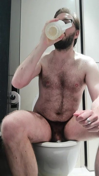 Hairy locked boy ordered to drink piss