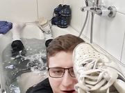 Fun in the bathtub with sneakers