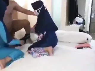 threesome with two Hijab Women