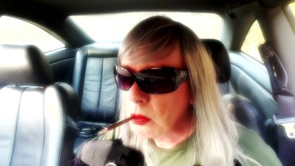 MRS. RUTHIE CAR SMOKING MORE120 MENTHOL with GLOVES and SUNGLASSES thumbnail