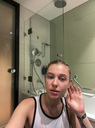 Jucielussie playing in the bathroom