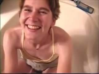 Giving wife golden rain in the tub before I cum on her face