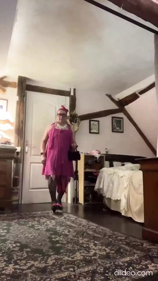 Dressed with a fuchsia evening dress for a night out