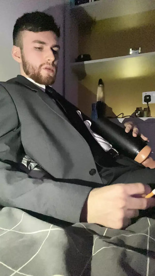 Lad Fucks Fleshlight in Suit and Smokes