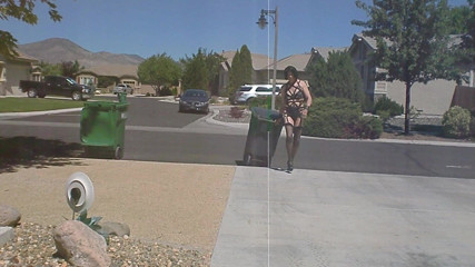 Bringing in Trash cans in Lingerie, heels, and wig.