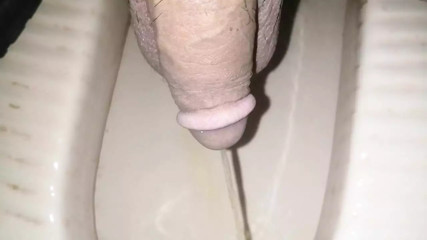 Pissing handjob guy in bathroom toady
