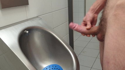 Naked edging and orgasm in public restroom