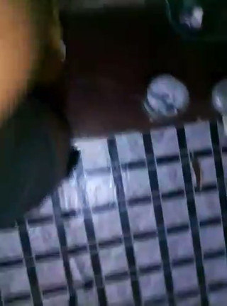 African amatuer stripping and spraying milk