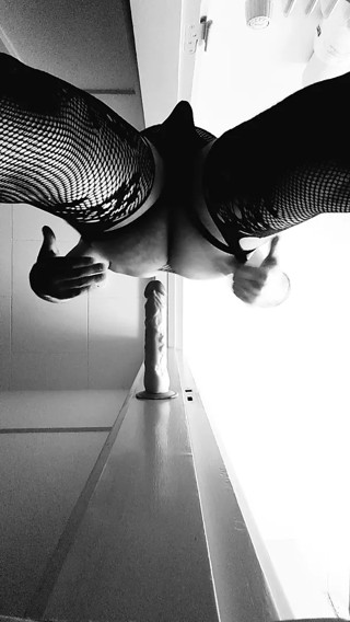 Virgin fucking dildo in doorway