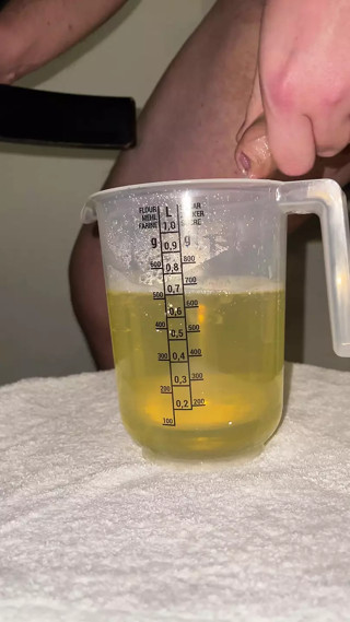 Huge piss and massive cumshot in cup