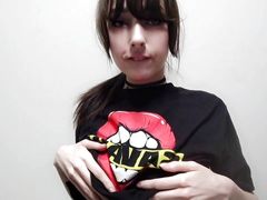 Bratty Goth girl teases by playing with tits