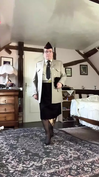 In military uniform with a black tie thumbnail