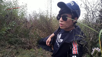 Cute gay Asian twink Jon Arteen speaks French wanks his smooth penis in the rain, lubricated with his saliva moans ejaculates